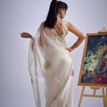 Off White Organza Saree with Floral Embroidery Border
