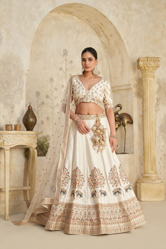 Elegant Cream Silk Embroidered Lehenga Choli with Elephant Motif and Dupatta for Wedding