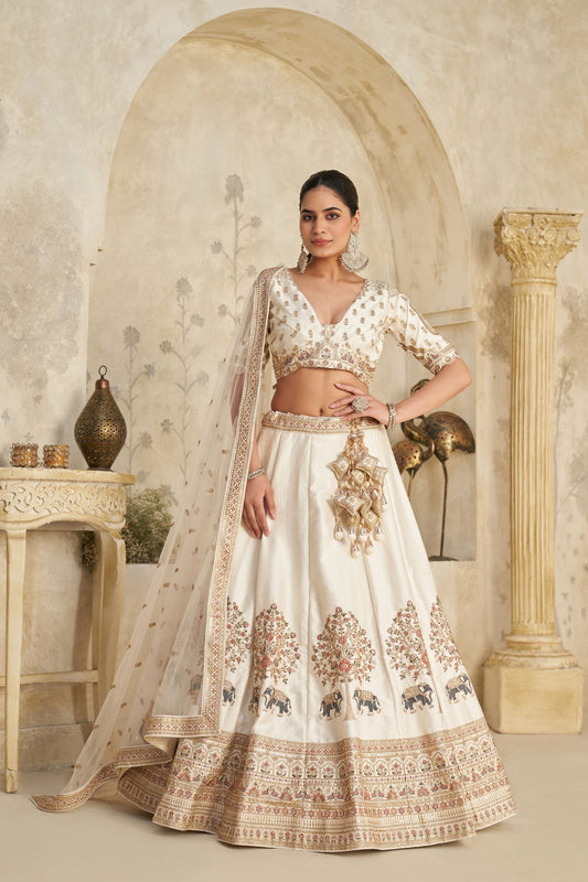 Elegant Cream Silk Embroidered Lehenga Choli with Elephant Motif and Dupatta for Wedding