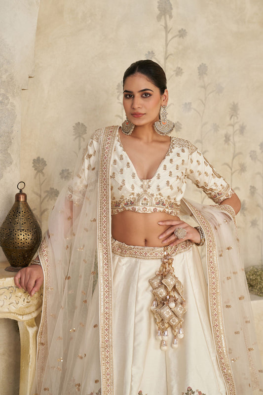 Elegant Cream Silk Embroidered Lehenga Choli with Elephant Motif and Dupatta for Wedding