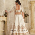 Elegant Cream Silk Embroidered Lehenga Choli with Elephant Motif and Dupatta for Wedding