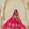 Vibrant Rani Pink Silk Embroidered Lehenga Choli with Elephant Motif and Dupatta for Wedding