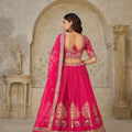 Vibrant Rani Pink Silk Embroidered Lehenga Choli with Elephant Motif and Dupatta for Wedding