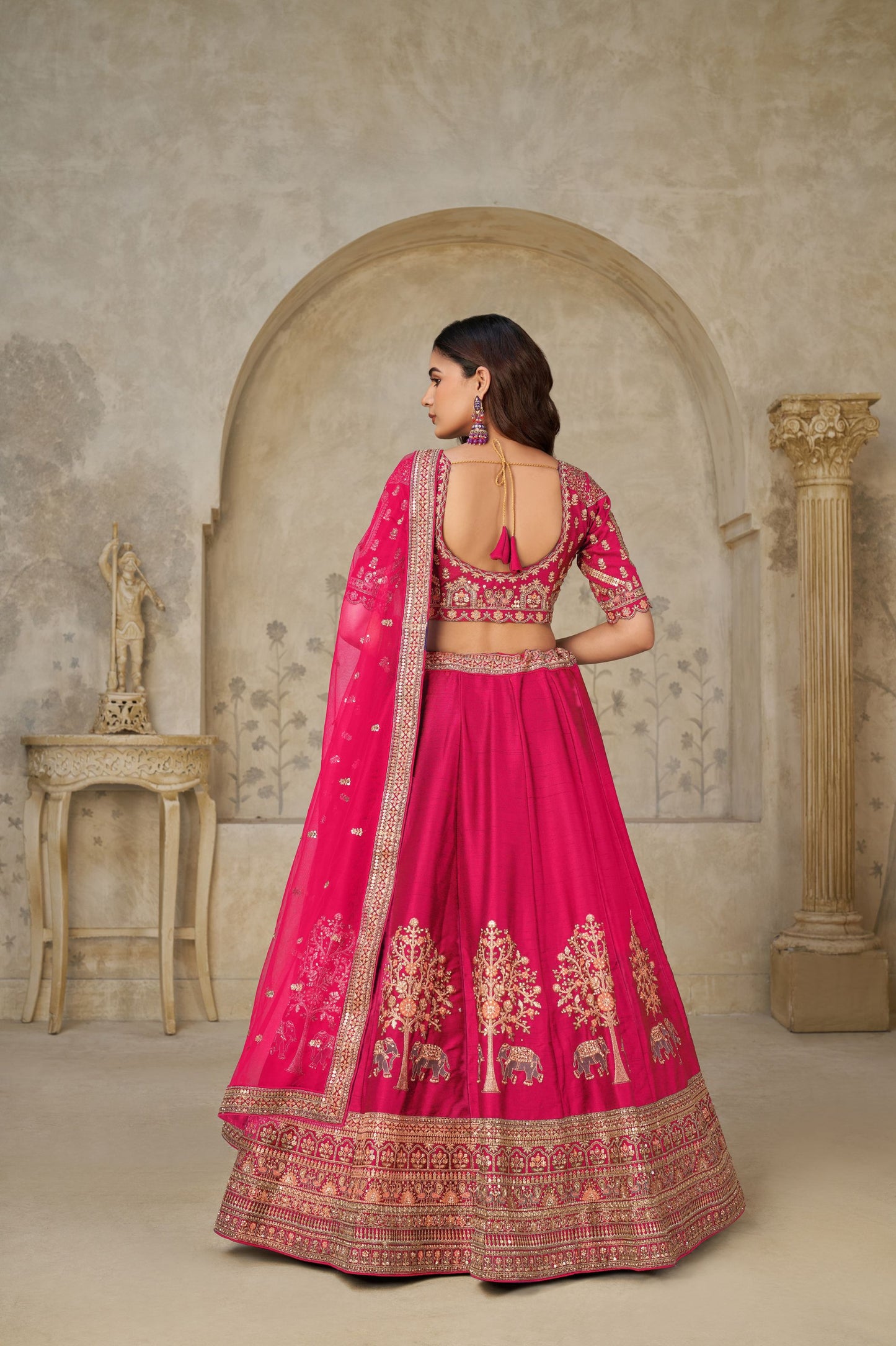 Vibrant Rani Pink Silk Embroidered Lehenga Choli with Elephant Motif and Dupatta for Wedding