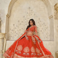Radiant Rust Orange Silk Embroidered Lehenga Choli with Elephant Motif and Dupatta for Wedding