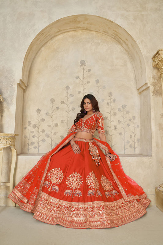 Radiant Rust Orange Silk Embroidered Lehenga Choli with Elephant Motif and Dupatta for Wedding