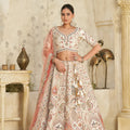 Charming Cream Silk Embroidered Lehenga Choli with Traditional Motifs and Dupatta for Wedding
