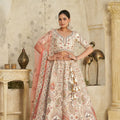 Charming Cream Silk Embroidered Lehenga Choli with Traditional Motifs and Dupatta for Wedding