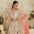 Charming Cream Silk Embroidered Lehenga Choli with Traditional Motifs and Dupatta for Wedding