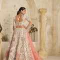 Charming Cream Silk Embroidered Lehenga Choli with Traditional Motifs and Dupatta for Wedding