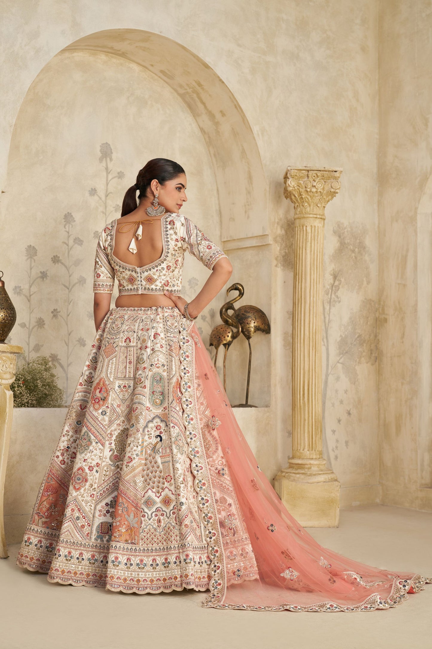 Charming Cream Silk Embroidered Lehenga Choli with Traditional Motifs and Dupatta for Wedding