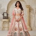 Graceful Cream Silk Embroidered Lehenga Choli with Palace Motifs and Dupatta for Wedding