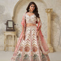 Graceful Cream Silk Embroidered Lehenga Choli with Palace Motifs and Dupatta for Wedding
