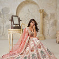 Graceful Cream Silk Embroidered Lehenga Choli with Palace Motifs and Dupatta for Wedding