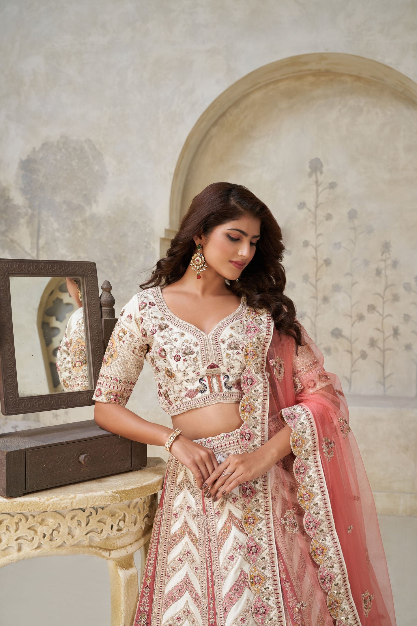 Graceful Cream Silk Embroidered Lehenga Choli with Palace Motifs and Dupatta for Wedding