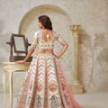 Graceful Cream Silk Embroidered Lehenga Choli with Palace Motifs and Dupatta for Wedding