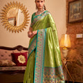 Elegant Green Banarasi Silk Saree with Blue  Pink Woven Border