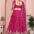 Magenta Embroidered Lehenga Choli with Silver Zari Peacock and Floral Design
