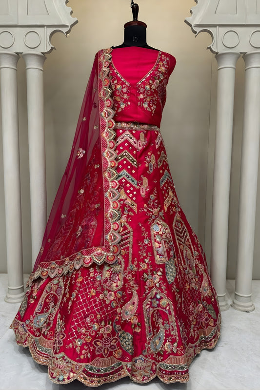 Luxurious Rani Pink Embroidered Silk Bridal Lehenga Choli with Net Dupatta