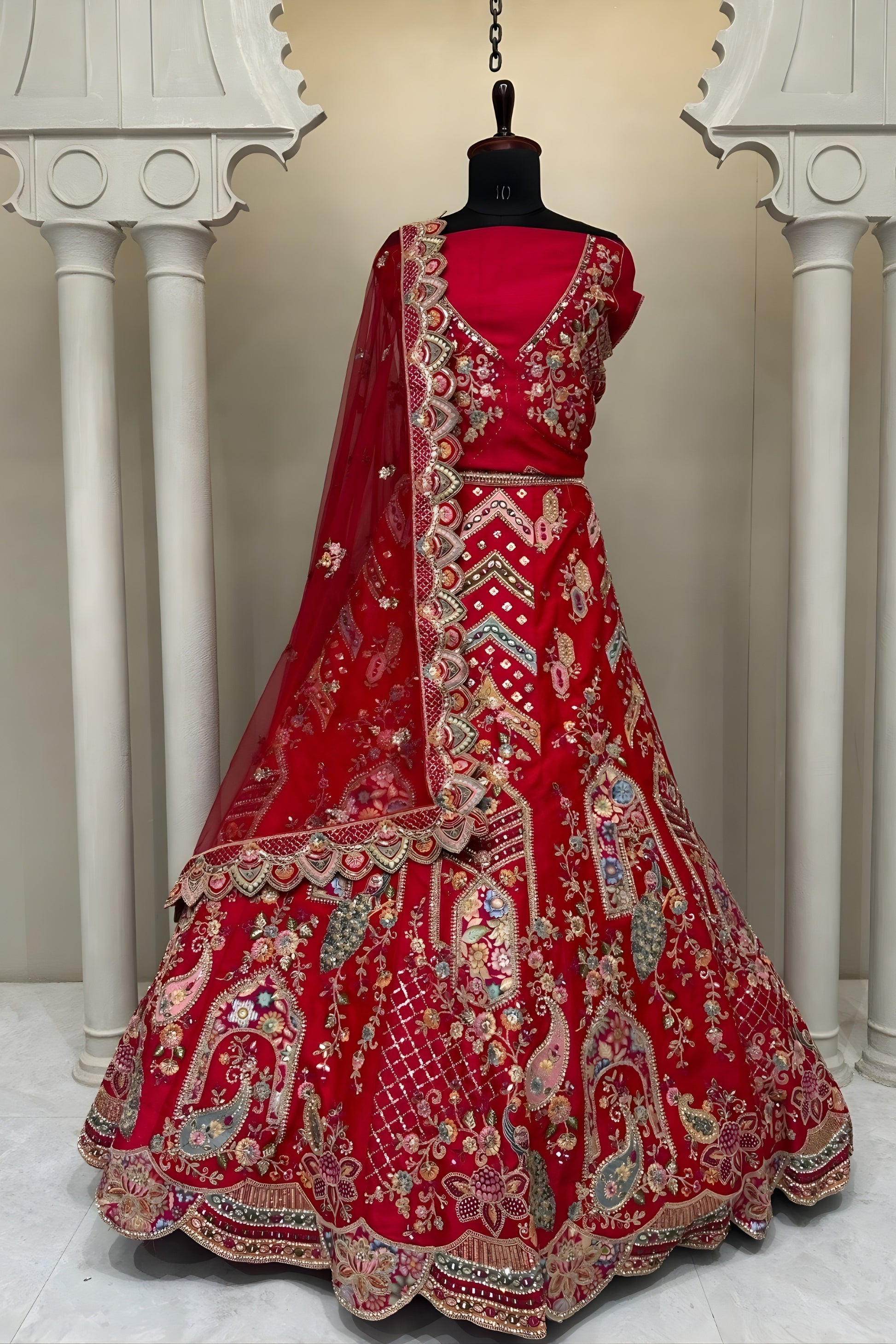 Opulent Red Embroidered Silk Bridal Lehenga Choli with Net Dupatta