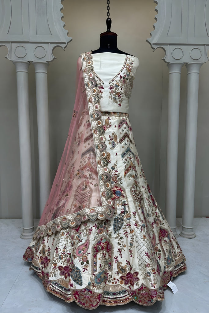 Grateful White Embroidered Silk Bridal Lehenga Choli with Net Dupatta