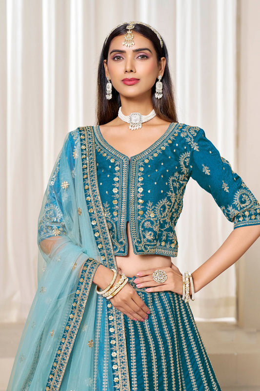 Trendy Teal Blue Art Silk Bridal Lehenga Choli with Heavy Golden Embroidery and Net Dupatta