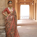 Rust Orange Patola Silk Saree with Intricate Ikat Weaving Zari Border