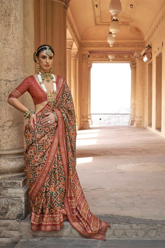 Rust Orange Patola Silk Saree with Intricate Ikat Weaving Zari Border