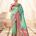 Turquoise Banarasi Silk Saree with Pink Zari Border Festive Wear