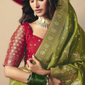 Green Banarasi Silk Saree Contrast Red Blouse Festive Wear