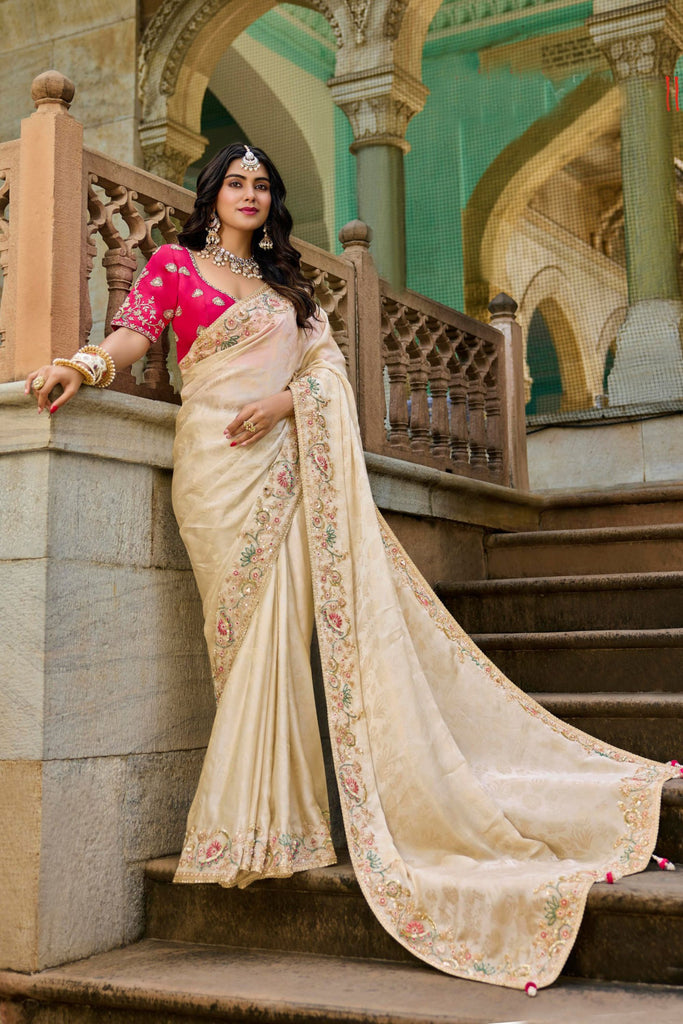 Elegant Cream Silk Saree Designer Pink Blouse Festive Wear
