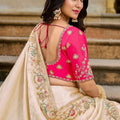 Elegant Cream Silk Saree Designer Pink Blouse Festive Wear