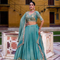 Elegant Teal Green Silk Embroidered Lehenga Choli with Floral Work and Matching Dupatta