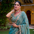 Elegant Teal Green Silk Embroidered Lehenga Choli with Floral Work and Matching Dupatta
