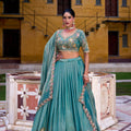 Elegant Teal Green Silk Embroidered Lehenga Choli with Floral Work and Matching Dupatta