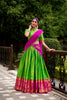 Traditional Parrot Green Poly Cotton Lehenga Choli with Pink Zari Border and Embroidered Dupatta
