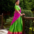 Traditional Parrot Green Poly Cotton Lehenga Choli with Pink Zari Border and Embroidered Dupatta