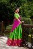 Traditional Parrot Green Poly Cotton Lehenga Choli with Pink Zari Border and Embroidered Dupatta