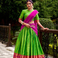 Traditional Parrot Green Poly Cotton Lehenga Choli with Pink Zari Border and Embroidered Dupatta