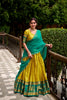 Unique Yellow Poly Cotton Lehenga Choli with Teal Green Zari Border and Embroidered Dupatta
