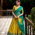 Unique Yellow Poly Cotton Lehenga Choli with Teal Green Zari Border and Embroidered Dupatta