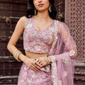 Elegant Dusty Pink Net Embroidered Wedding Lehenga Choli with Floral Sequins Work