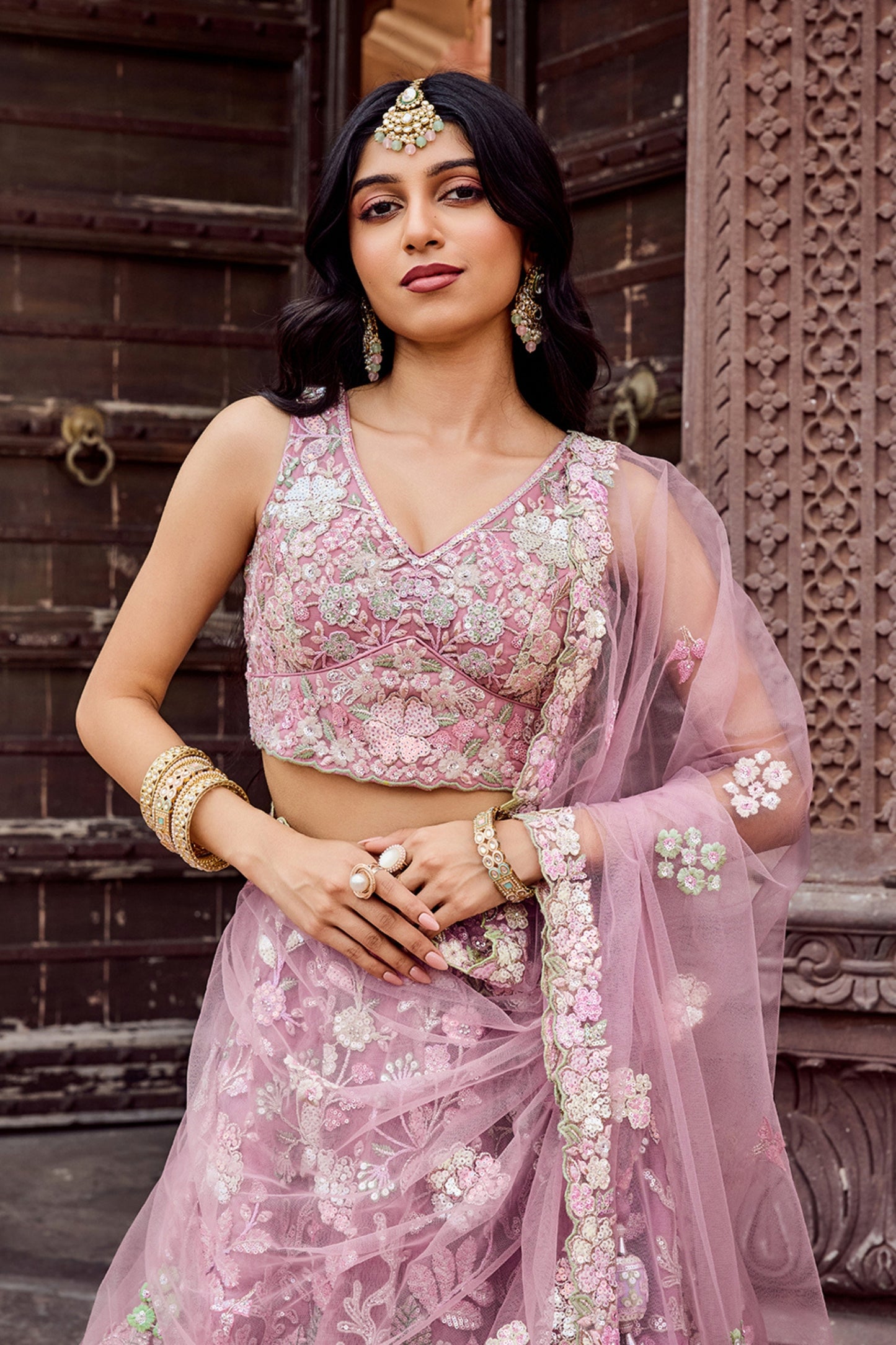 Elegant Dusty Pink Net Embroidered Wedding Lehenga Choli with Floral Sequins Work