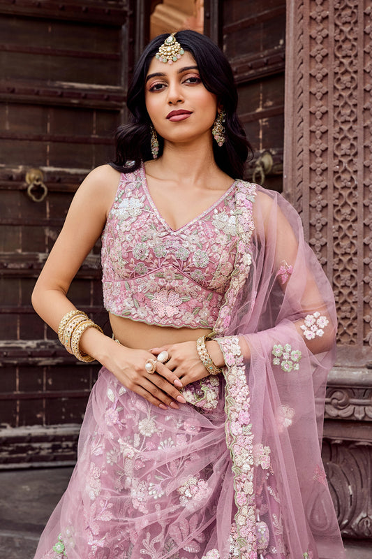 Elegant Dusty Pink Net Embroidered Wedding Lehenga Choli with Floral Sequins Work