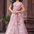 Elegant Dusty Pink Net Embroidered Wedding Lehenga Choli with Floral Sequins Work