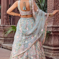 Stylish Turquoise Blue Net Embroidered Wedding Lehenga Choli with Floral Sequins Work