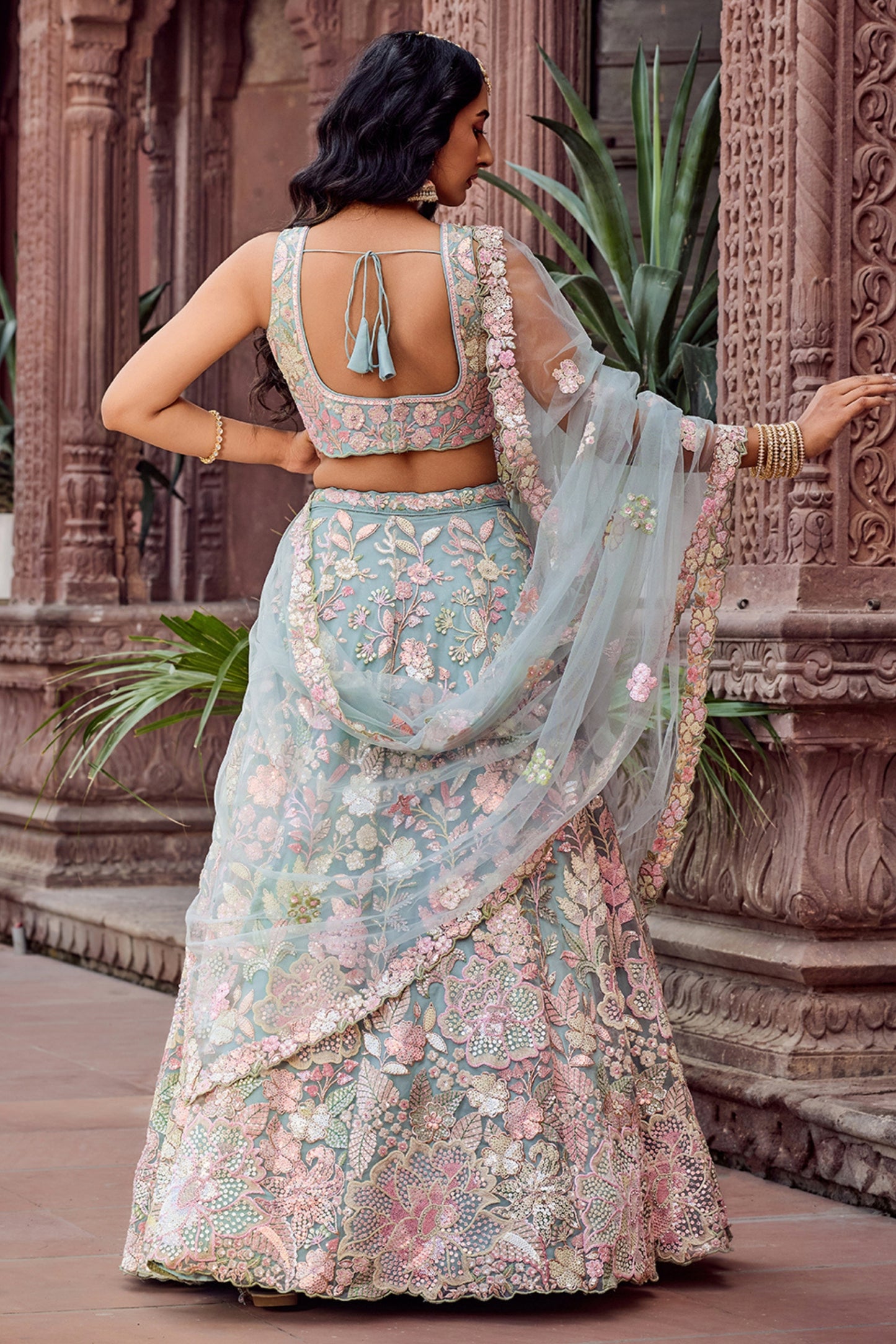 Stylish Turquoise Blue Net Embroidered Wedding Lehenga Choli with Floral Sequins Work