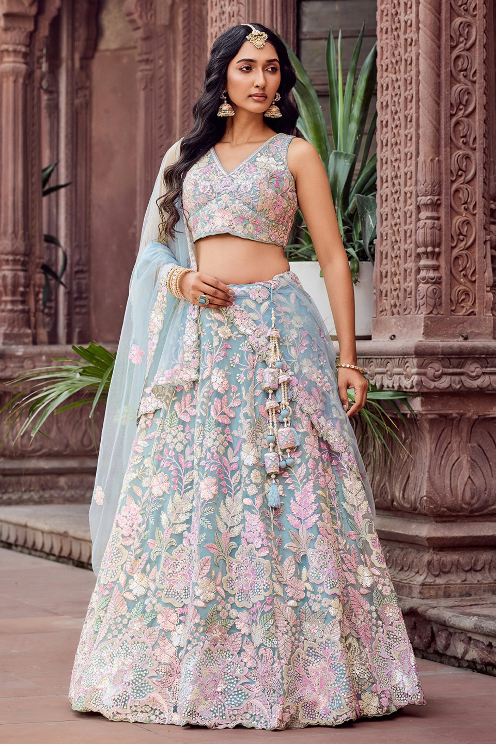 Stylish Turquoise Blue Net Embroidered Wedding Lehenga Choli with Floral Sequins Work
