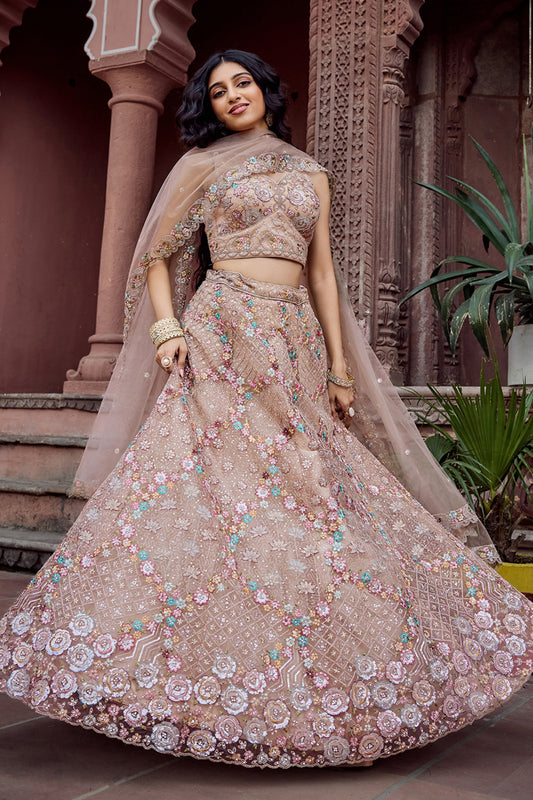 Gorgeous Beige Net Embroidered Wedding Lehenga Choli with Floral Sequins Work