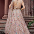 Gorgeous Beige Net Embroidered Wedding Lehenga Choli with Floral Sequins Work